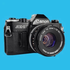 Canon® Canon AE-1 Black 35mm SLR Film Camera With Canon Prime Lens -Film Camera Store canon ae 1 black 35mm slr film camera with canon prime lens 3