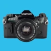 Canon® Canon AE-1 Program BLACK 35mm SLR Film Camera With Canon Prime Lens