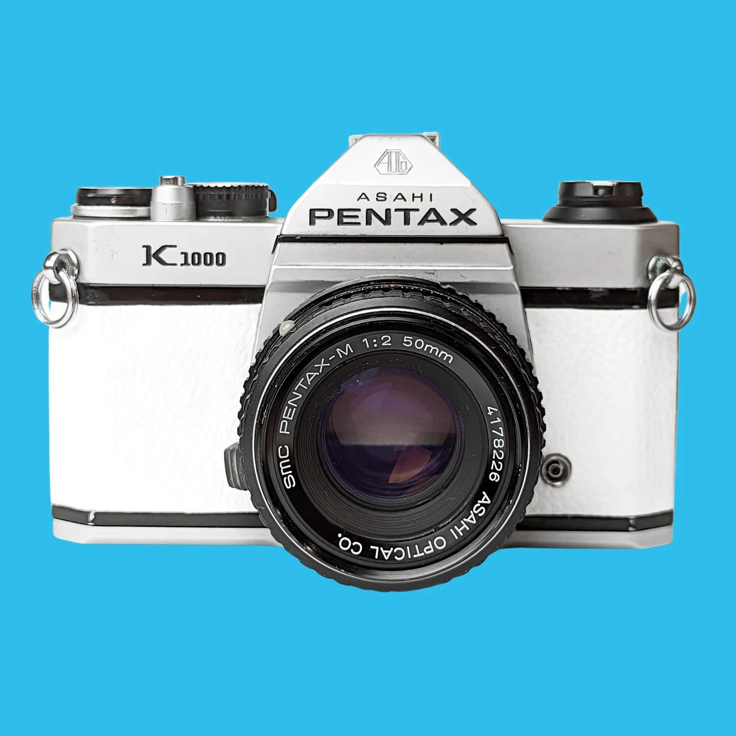 Pentax K1000 White Leather Vintage SLR 35mm Film Camera With Pentax F/2 50mm Prime Lens 3 Pentax K1000 White Leather Vintage SLR 35mm Film Camera With Pentax F/2 50mm Prime Lens
